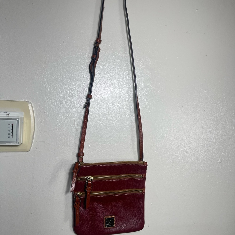 Dooney Bourke  burgundy  grain North South Triple Zip Crossbody (gently loved) - Picture 4 of 8